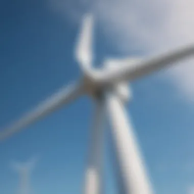 A wind turbine set against a clear blue sky, showcasing the power of wind energy.