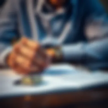 A person reviewing insurance documents with a watch beside them.